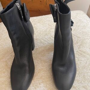 Trendy black leather bow booties